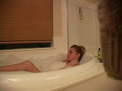 TargetVids presents: Hidden camera captures girl masturbating in bathtub