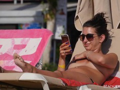 TargetVids presents: Topless amateur relaxes on a lounge chair