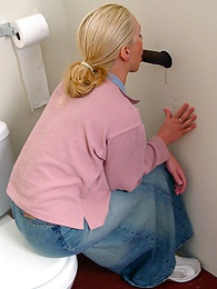 TargetVids presents: Blonde girl Jamie sits on the toilet and blows a black gloryhole dong