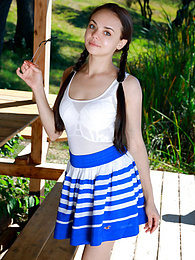 TargetVids presents: Fresh-Faced russian beauty Mia Grandy gets totally naked on a picnic table in a garden